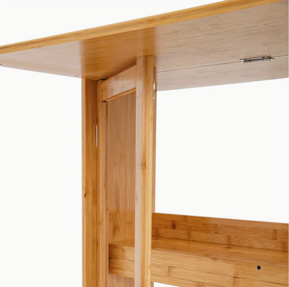 Détail du piètement, de la charnière et de l'étagère basse du bureau pliable en bois bambou