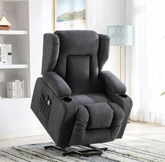 Fauteuil relax massage électrique releveur en tissu gris en position relevée dans un salon