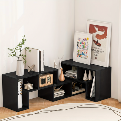 Meuble télé modulable noir en configuration d'angle dans une chambre